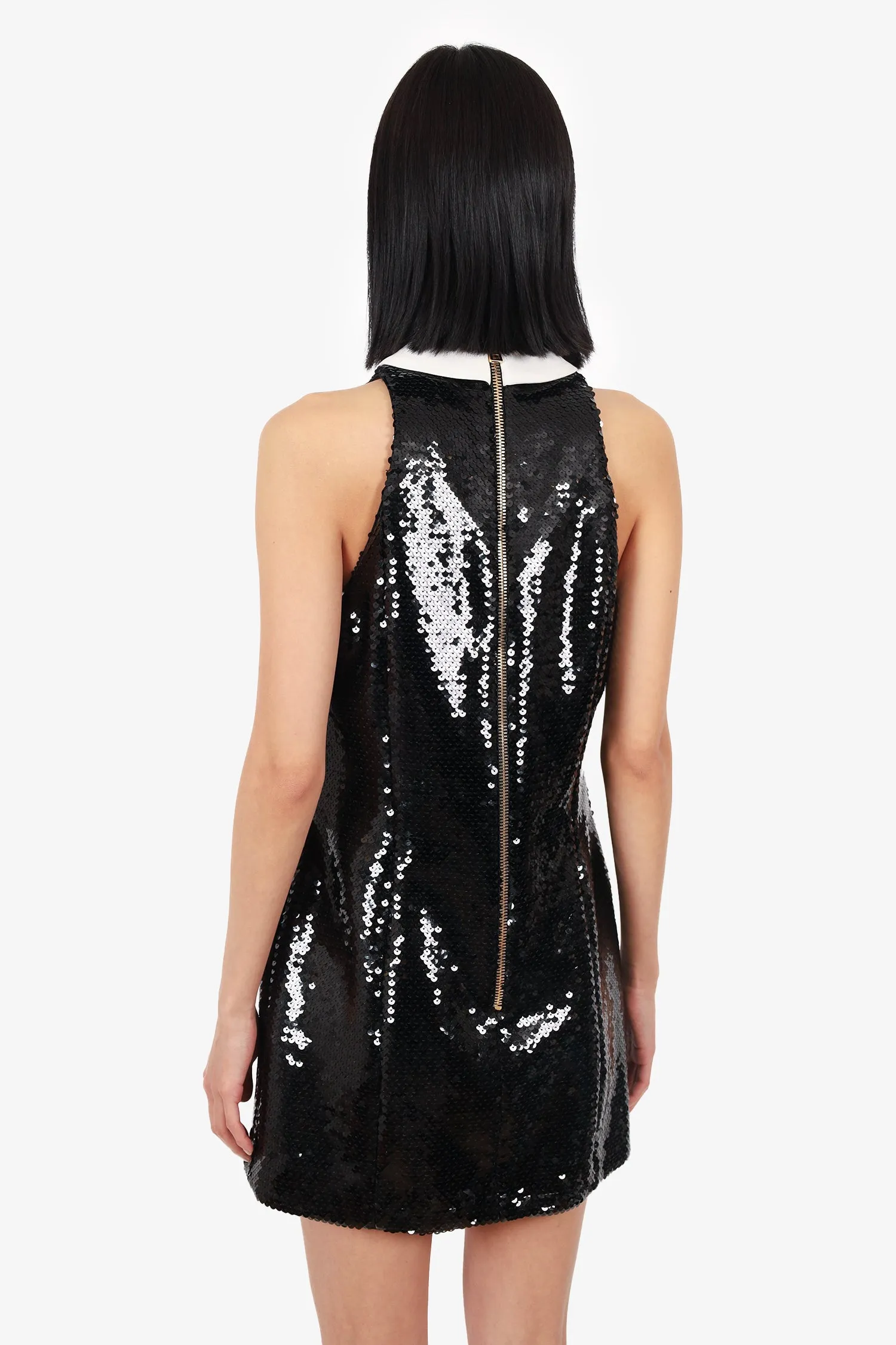 Robe mini sequinée Balmain noir/blanc avec panneau à volants taille 38