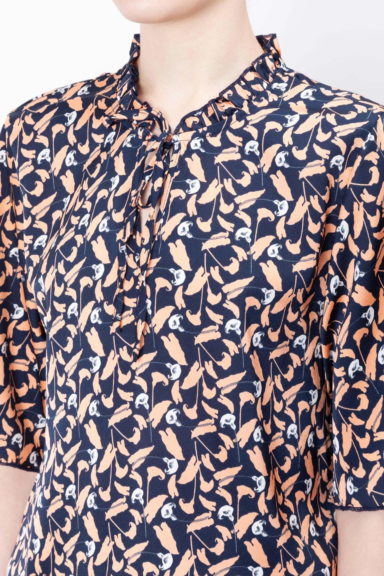 Blouse à col noué imprimée florale