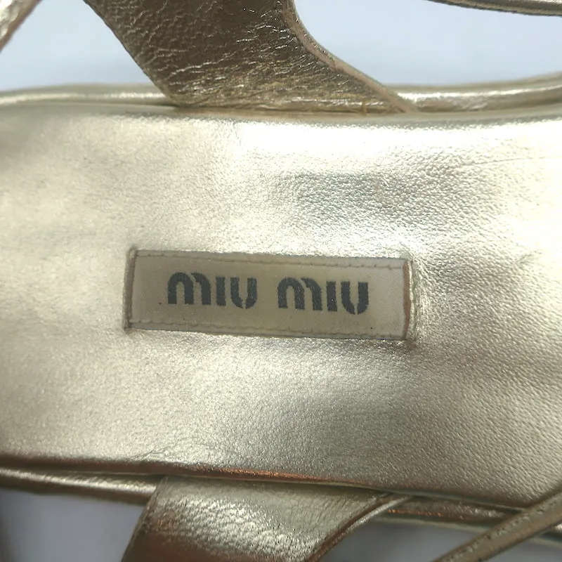 Miu Miu Sandales Gladiator à Enroulement Cheville en Cuir Métallisé Or Taille 38.5