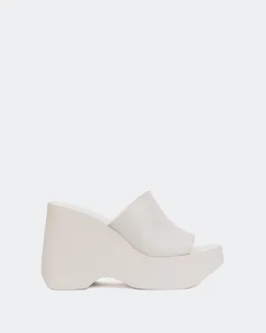Cuir blanc délavé mousse