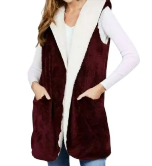 Veste en fourrure réversible bordeaux et crème